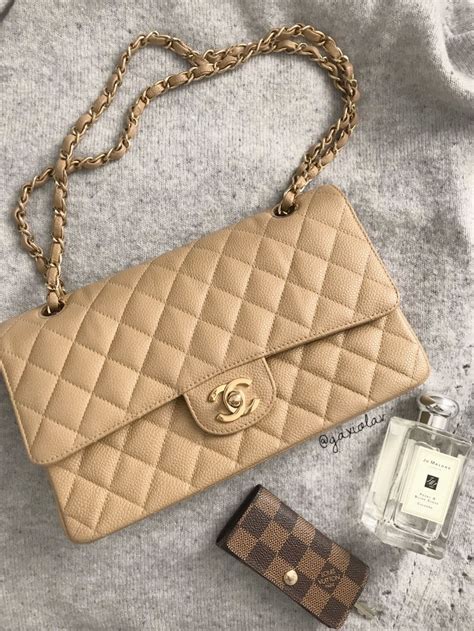 chanel classic flap black vs beige|original Chanel classic flap bag.